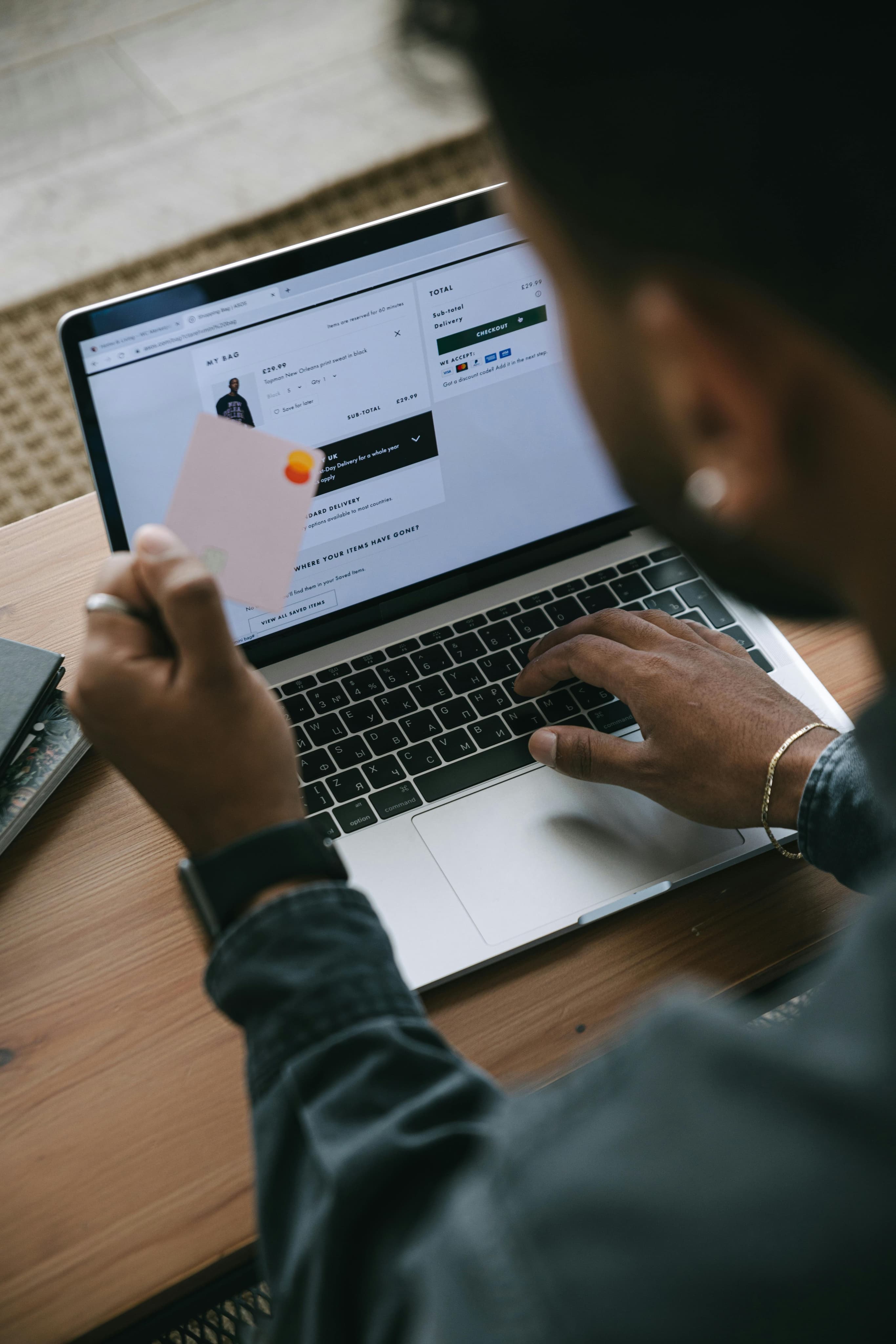 Reviewing a payment dashboard on a laptop